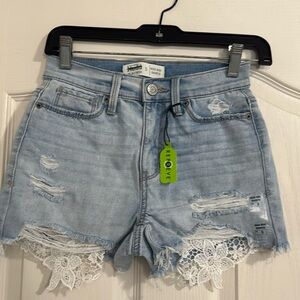 REVOLVE Light Blue Distressed Denim Shorts with White Crochet Hem